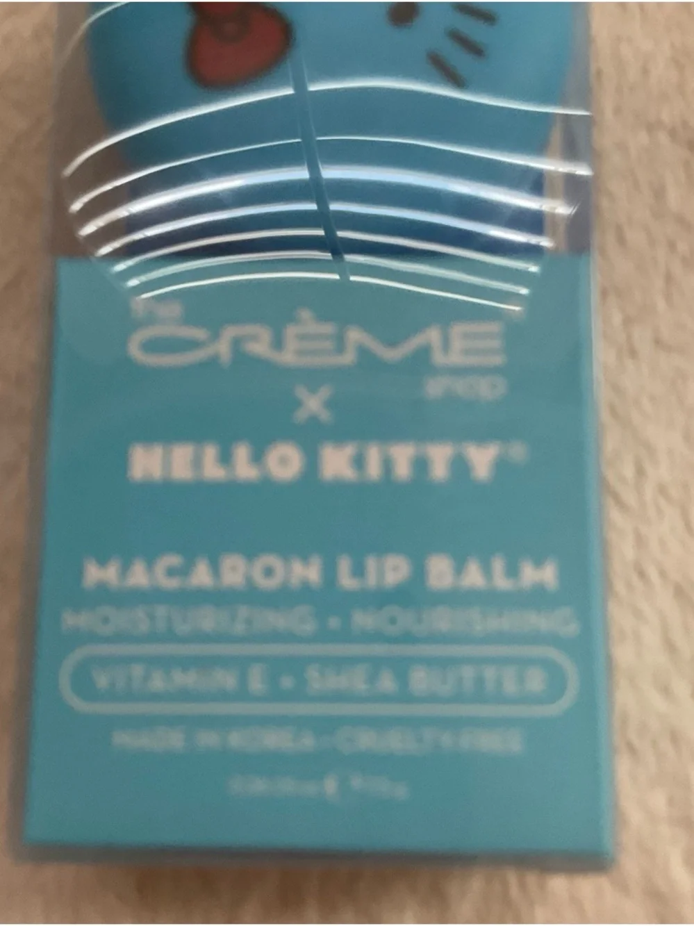 The Crème Shop x Hello Kitty Macaron Lip Balm - Cool As Mint (Blue)